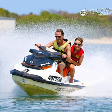 Father and Son on a Jet Ski — Jet Ski Hire and Tours in Main Beach, QLD