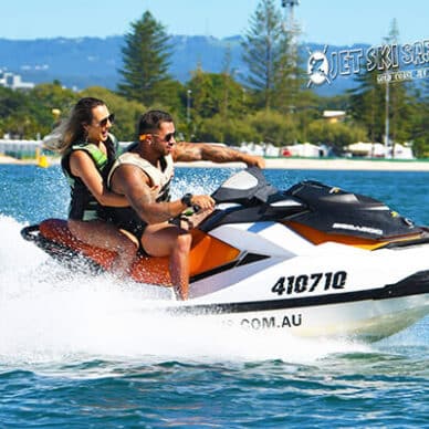Couple on a Jet Ski — Jet Ski Hire and Tours in Main Beach, QLD