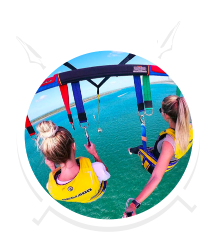 Two Woman Parasailing in Main Beach, QLD