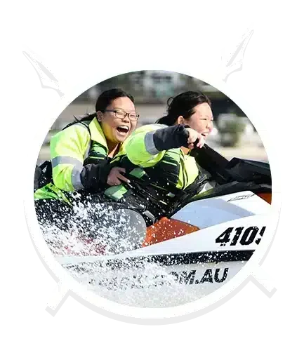 Two Woman Riding Jet Ski — Jet Ski Hire and Tours in Main Beach, QLD