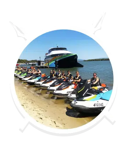 A Group in Corporate is Lined-Up with their Jet Skis in Main Beach, QLD
