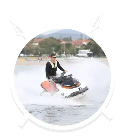 A Man is Standing in the Orange Jet Ski in Main Beach, QLD